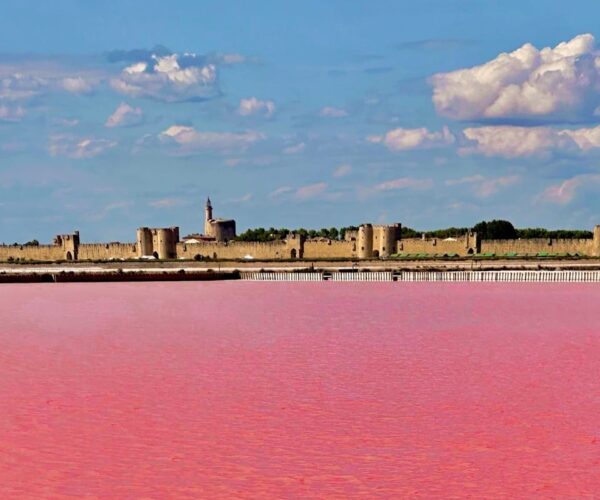 Medieval Town By A Bubblegum Pink Lake: One Of The Last True Hidden Gems In France